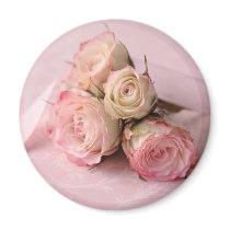pale roses on pink swirls magnet