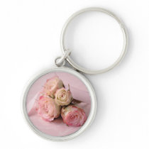 pale roses on pink swirls premium round keychain