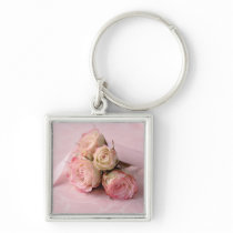 pale roses on pink swirls square keychain
