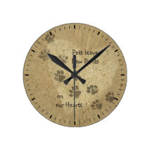 Pets leave Paw Prints on our Hearts Round Wall Clocks