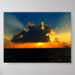 Photo of a cloud illuminated by sunlight. posters