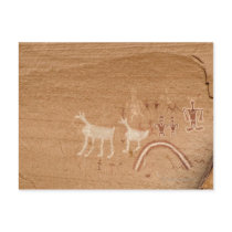 Pictographs on sandstone canyon walls in Canyon Post Card