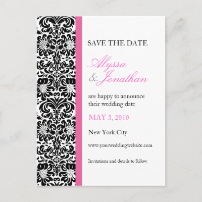 A blackandwhite damask wallpaper pattern along with pink accents serve to
