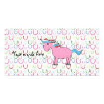 Pink unicorn on horseshoes