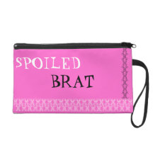 Pink wristlet with the words Spoiled Brat