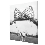 Play starts in a lacrosse team with the draw.Two Gallery Wrapped Canvas