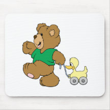 playful teddy bear with toy ducky mouse mat