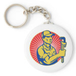 plumber repairman holding pipe wrench woodcut keychains