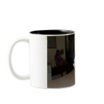 pomeranian in mailman costume mugs