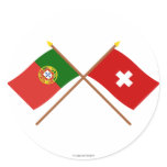 Portugal and Switzerland Crossed Flags Round Sticker