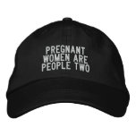 pregnant women are people two embroidered hats