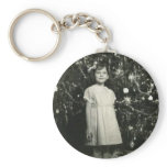 Pretty girl by Christmas tree keychains