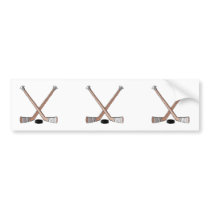 puck and hockey sticks design bumper sticker