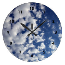 Puffy Clouds On Blue Sky