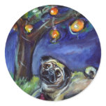 pug with kong under chinese lamp night sky round sticker