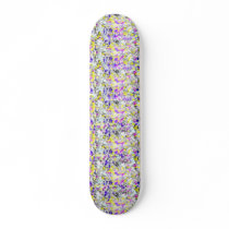 purple and yellow splatter and paint drip skate deck