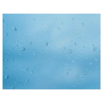 Rain drops on the glass of window flyer