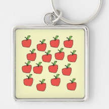 Red apple pattern, on cream. keychains