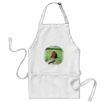 Red-Brown Haired Orangutan Sitting On Grass Apron