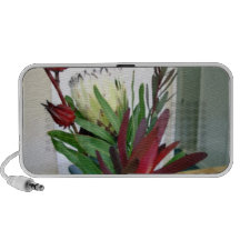 Red buds and white flowers travelling speakers