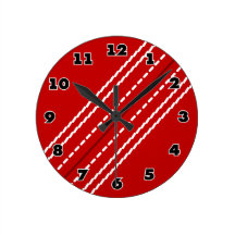 Red cricket ball sports clock for club or home