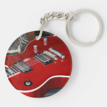 Red guitar on amp round acrylic keychains