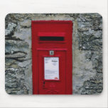 red letter box mounted on wall mousepads