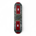 red letter box mounted on wall skateboards
