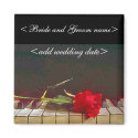 Red Rose Laying On Piano Keyboard magnets