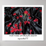 red rose on black satin posters