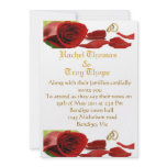 Red roses and wedding ring invitations