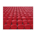 Red seats at football stadium postcards