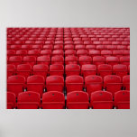 Red seats at football stadium posters