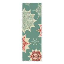 Red snowflakes on a green background business card template