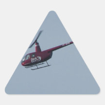 Red tourist helicopter. triangle sticker