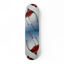 Red wine poured into wine glass skate deck