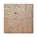Relief depicting acrobats and a harpist refrigerator magnet