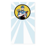 repairman serviceman holding ac manifold gauge wre business cards