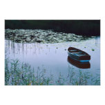 Rowboat on small lake surrounded by water photographic print