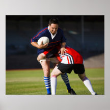 Rugby player tackling another posters