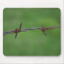 Rusty barb wire fence mousepad