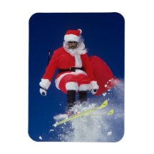Santa Claus on skis jumping off a cornice at Rectangular Magnets