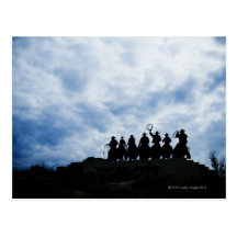 sculpture that welcomes you to Dodge City Kansas Postcards