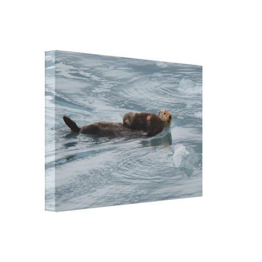 sea otter and baby stretched canvas prints