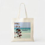 seashells on sea background tote bag