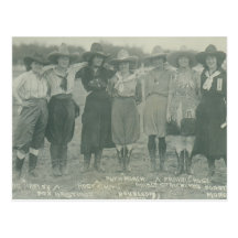 Seven rodeo cowgirls posing for a photograph. postcard