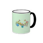 Side view of children playing on tree branch coffee mug