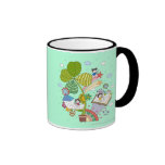 Side view of children studying by potted plant coffee mugs