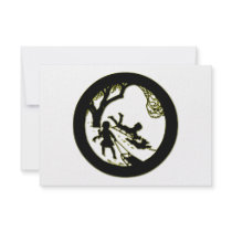 Silhouette of children sledding with their dog