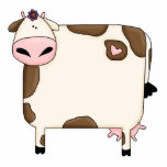 silly fat brown and white cow cartoon photo sculptures